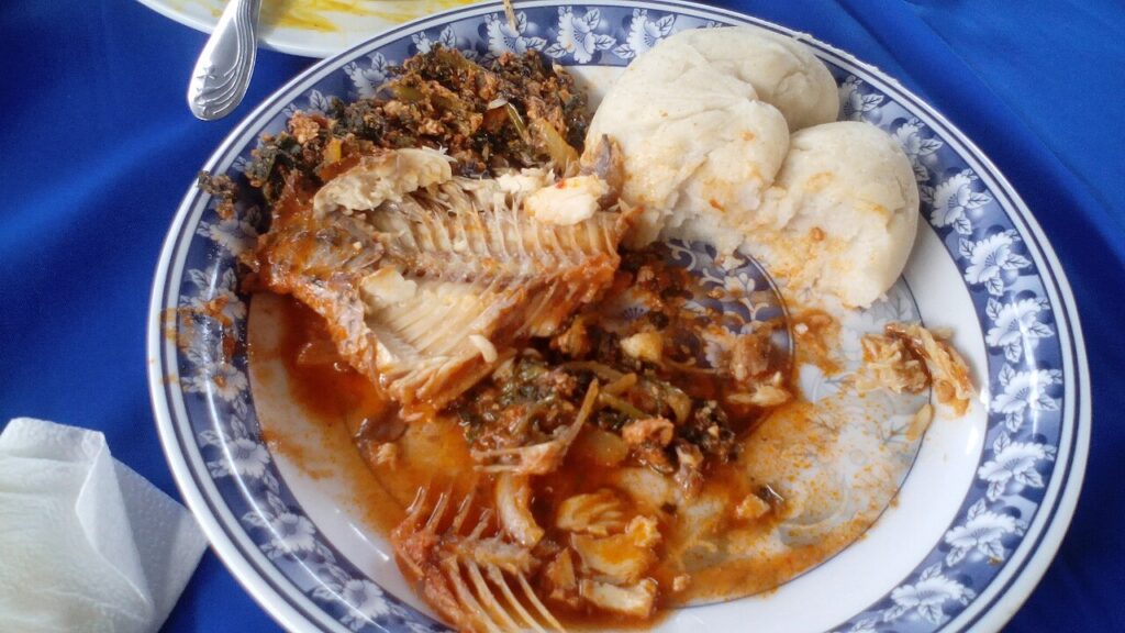 Gboma Dessi and Akoume (Togolese Spinach Stew with Corn Swallow)