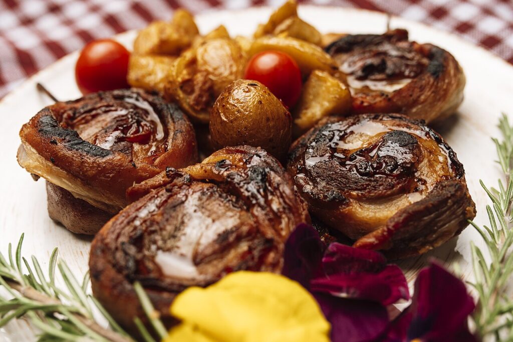 Potatoes Roasted under Meat