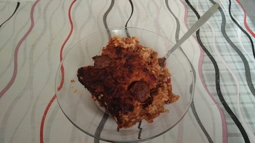 Rice Cooked in Tomato Meat Sauce (Ross il-Forn)
